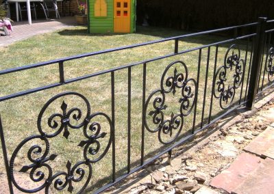 Bespoke railing with scrolled panels